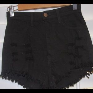 Ripped black shorts